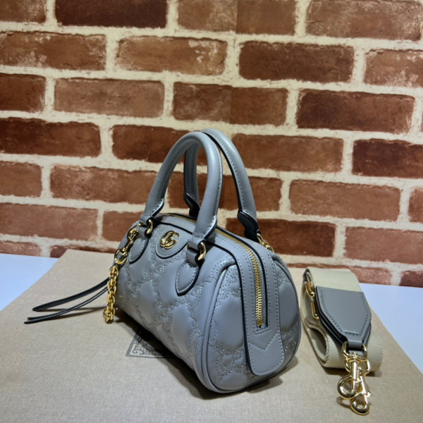 G*u*i gg matelassé leather top handle bag