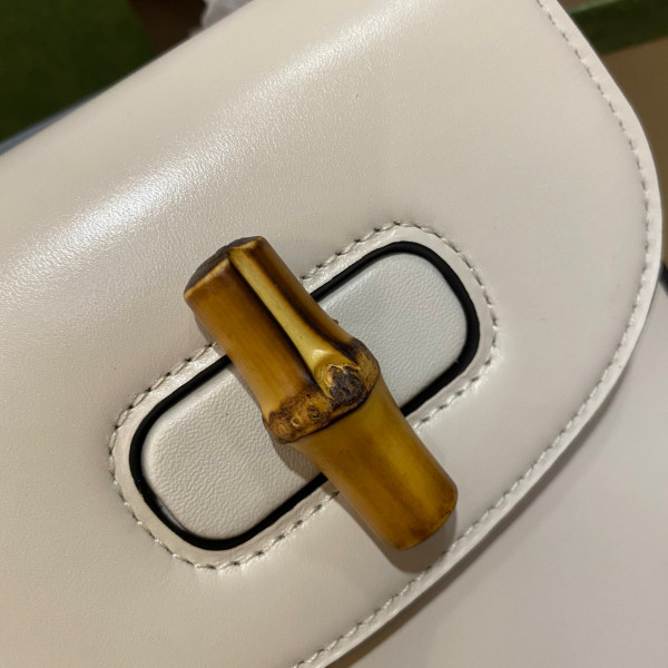 G*u*i bamboo mini handbag