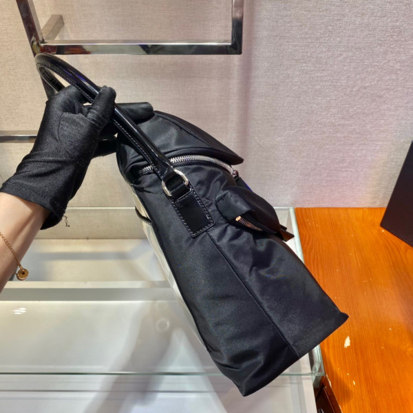 Pra*a signaux nylon and leather hobo bag