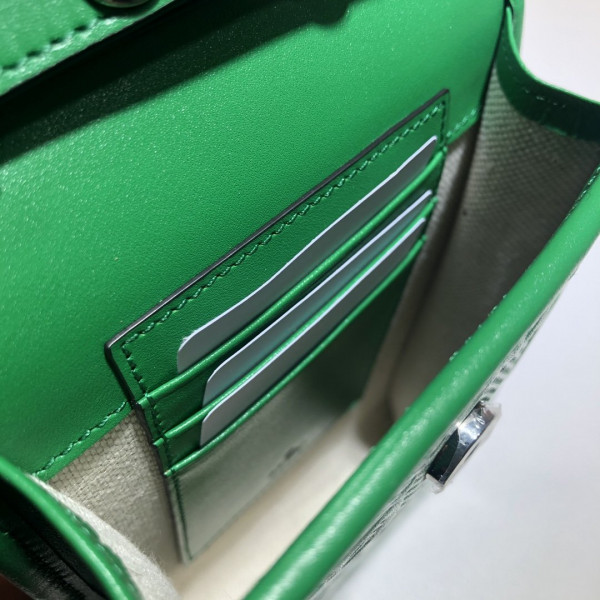 G*u*i gg embossed mini bag