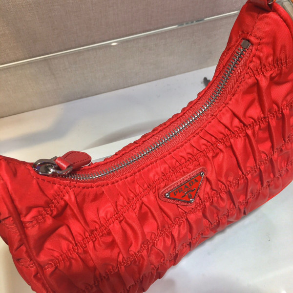 Pra*a nylon and saffiano leather mini bag