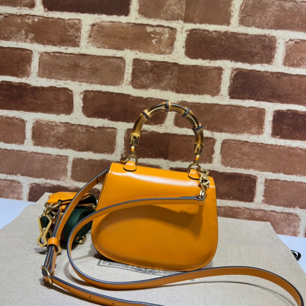 G*u*i mini top handle bag with bamboo