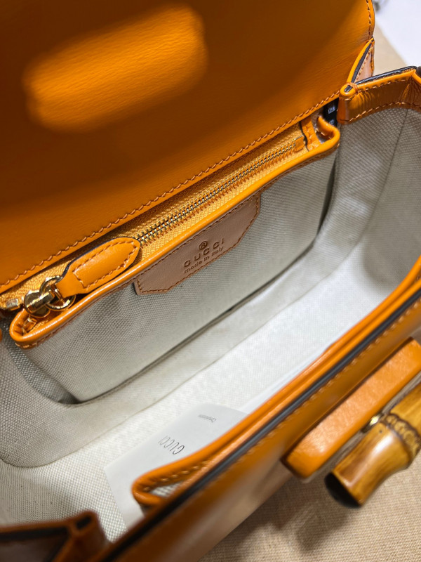 G*u*i small top handle bag with bamboo