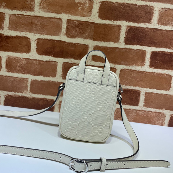 G*u*i gg embossed mini bag