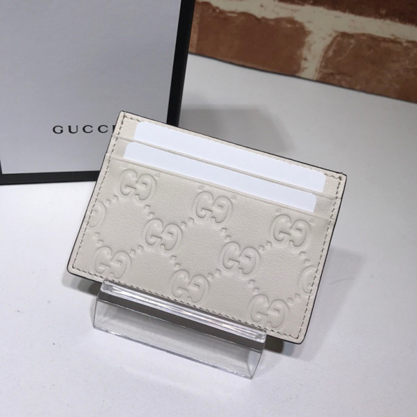 G*u*i signature card case