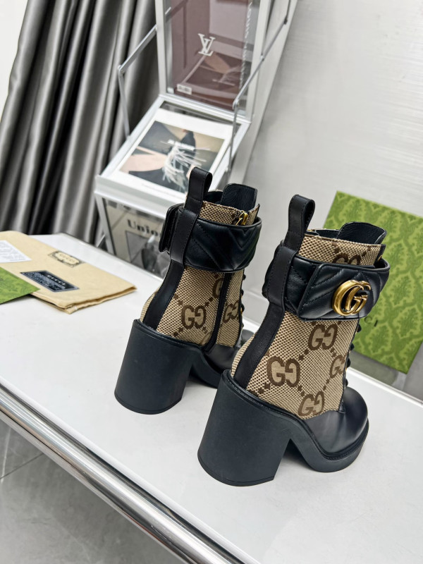 G*u*i boots
