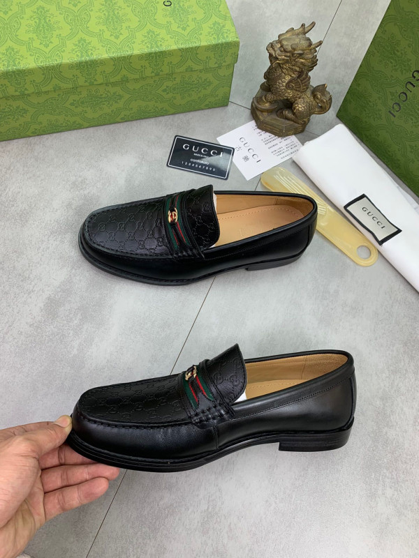 G*u*i loafers
