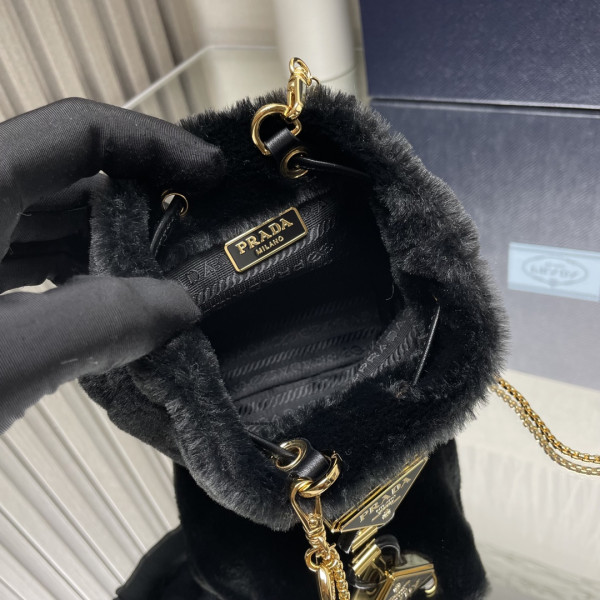 Pra*a shearling bucket bag